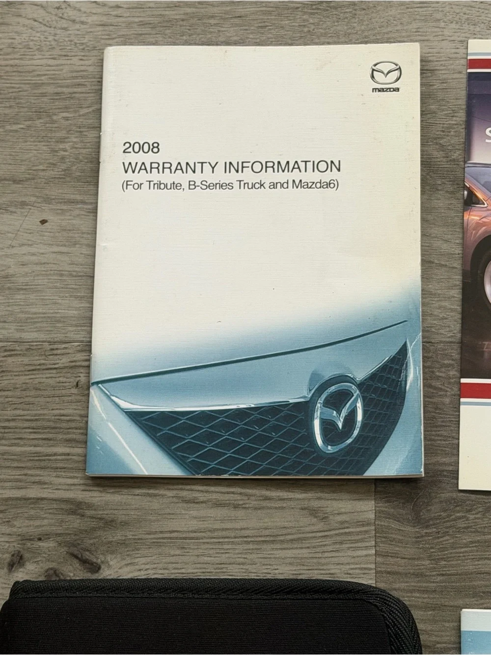 2008 Mazda OEM Drivers Handbook Manual in Black Zip Around Case